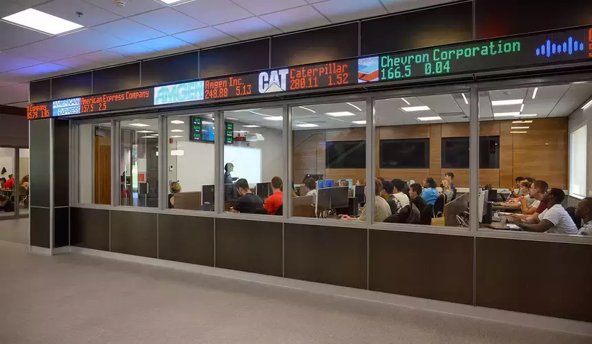 Stock ticker scrolls above the windows of the Bloomberg Room.