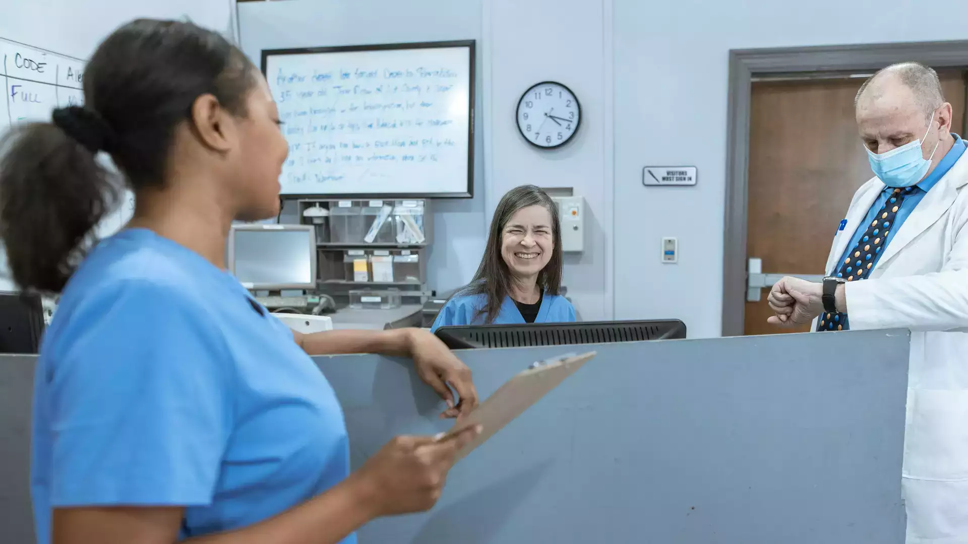 3 people in a health care setting