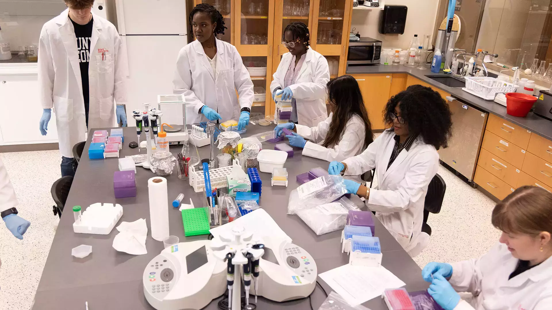 Chemistry students getting hands-on lab experience.