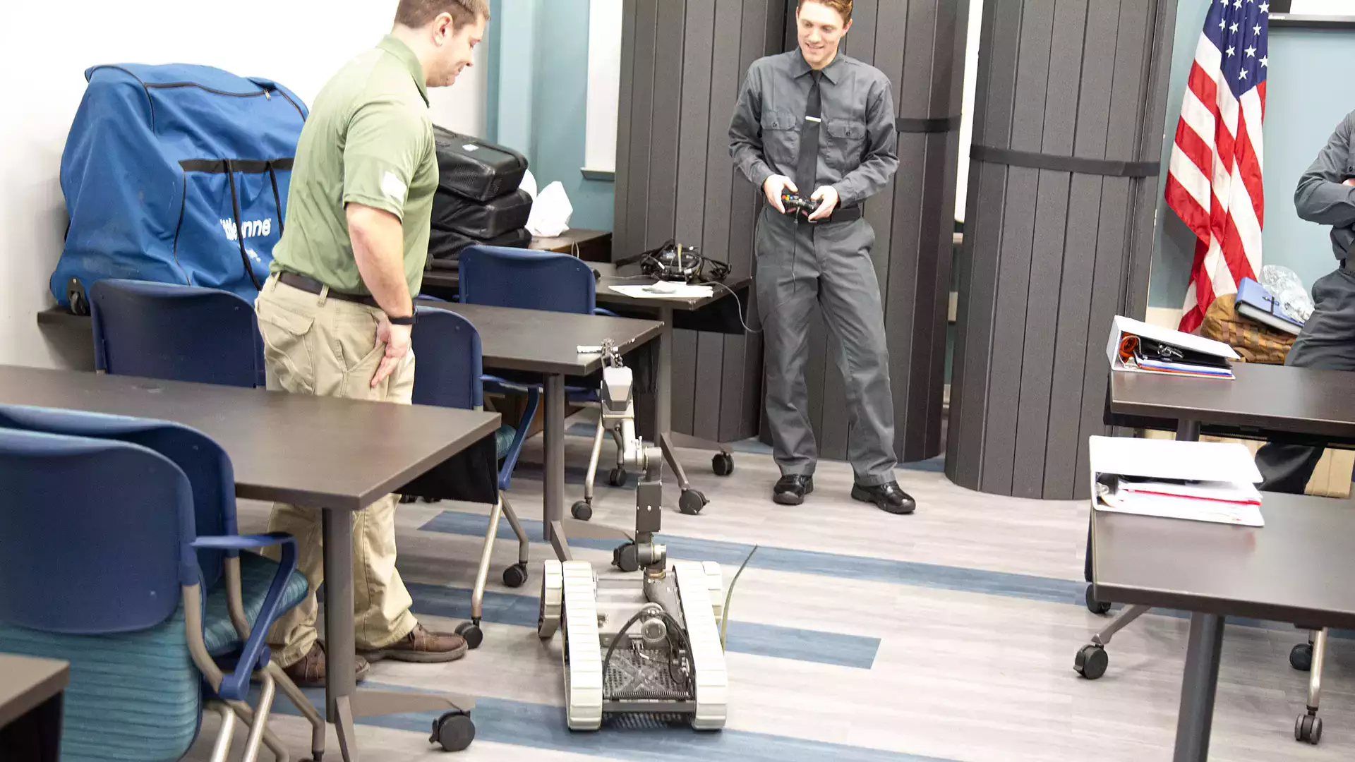 Cadets work with a robot at the Otsego County Law Enforcement Academy.