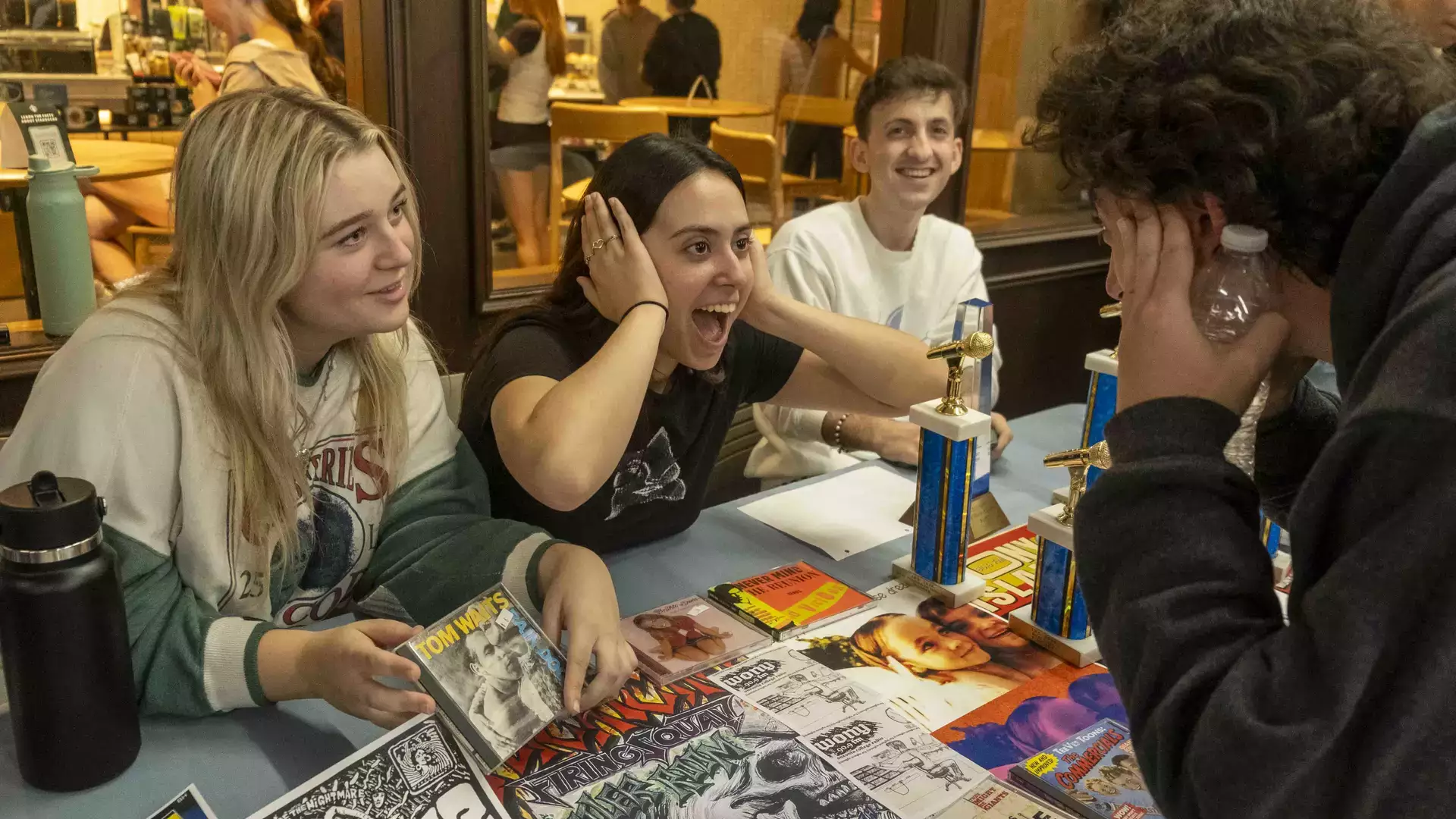 Students involved in WONY, the campus radio station, recruit members at the annual Club eXpo